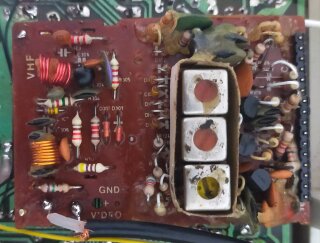 The topside of the RF modulator board with the shielding removed