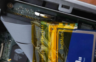 Compact flash to IDE with ribbon cable.