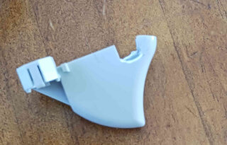 Broken tabs cut away.